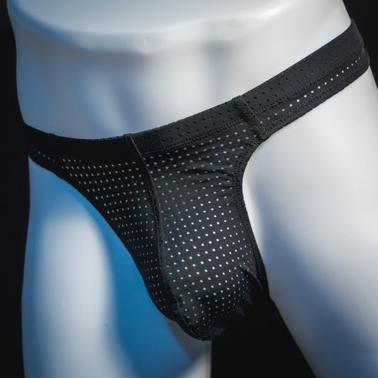 Men's black mesh pre-release thong underwear, angled front view.