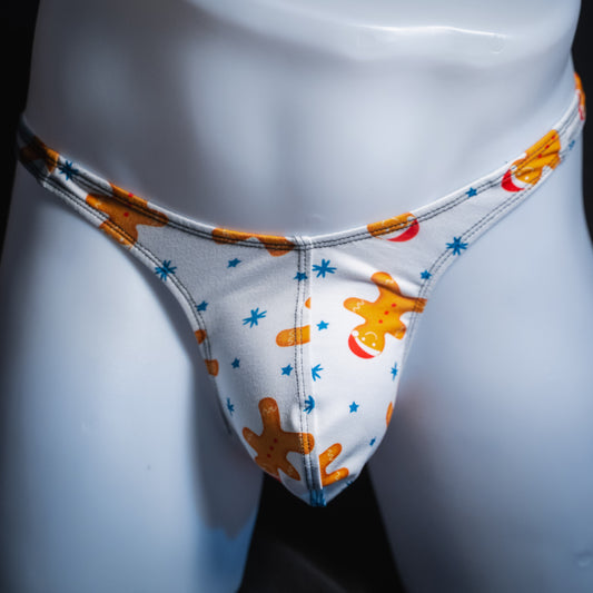Men's white with gingerbread men thong underwear, slim cut, Front view.