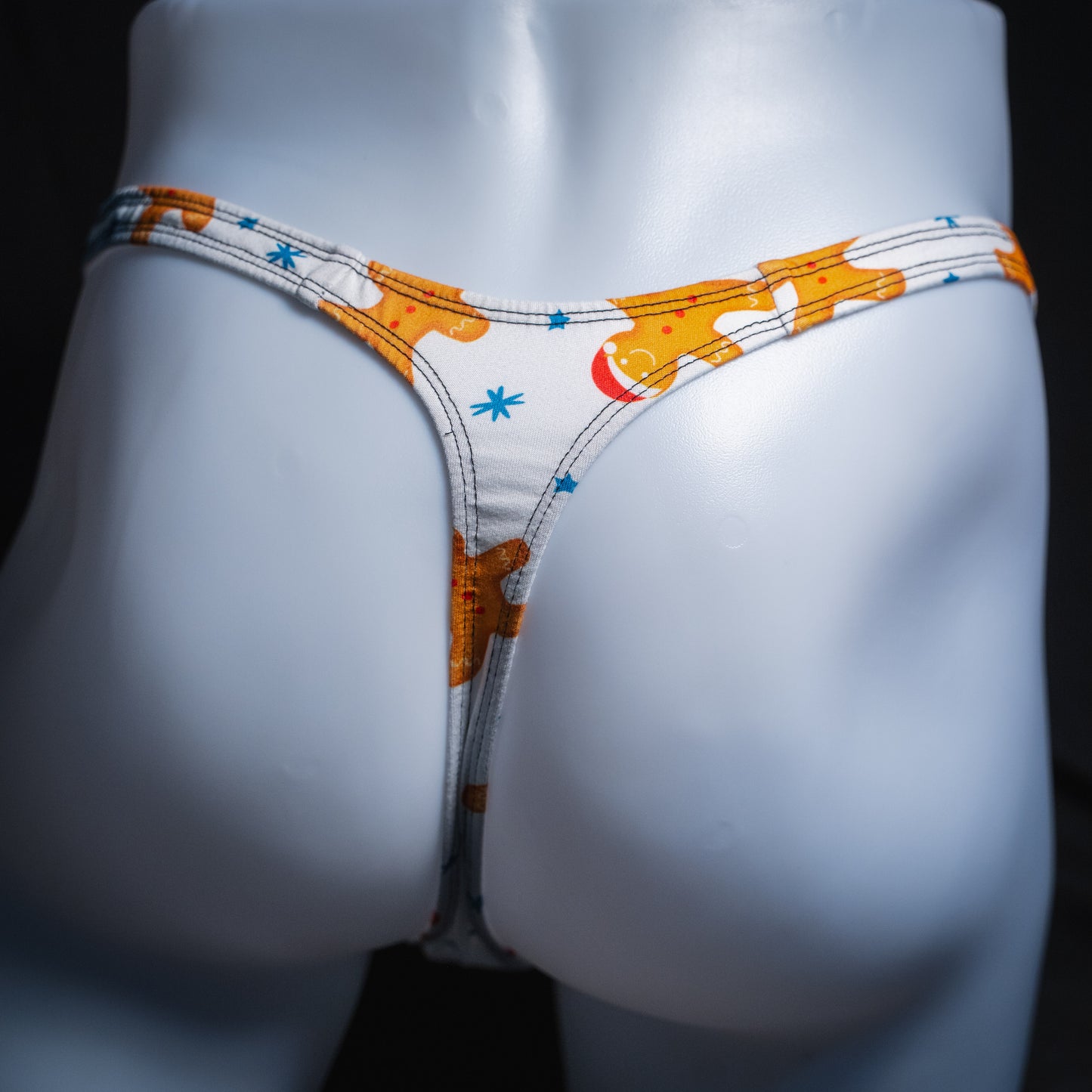 Men's white with gingerbread men thong underwear, slim cut,