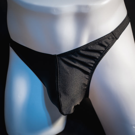 Men's solid black spandex thong underwear. classic cut, front view.