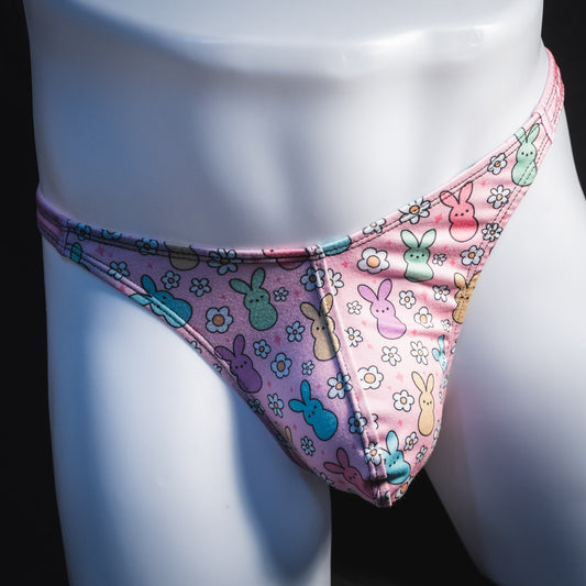 Men's pink easter bunnies thong underwear, classic cut, front view.