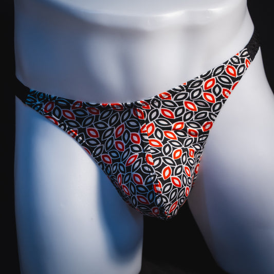 Men's black white and red petal thong underwear, classic cut, front view.