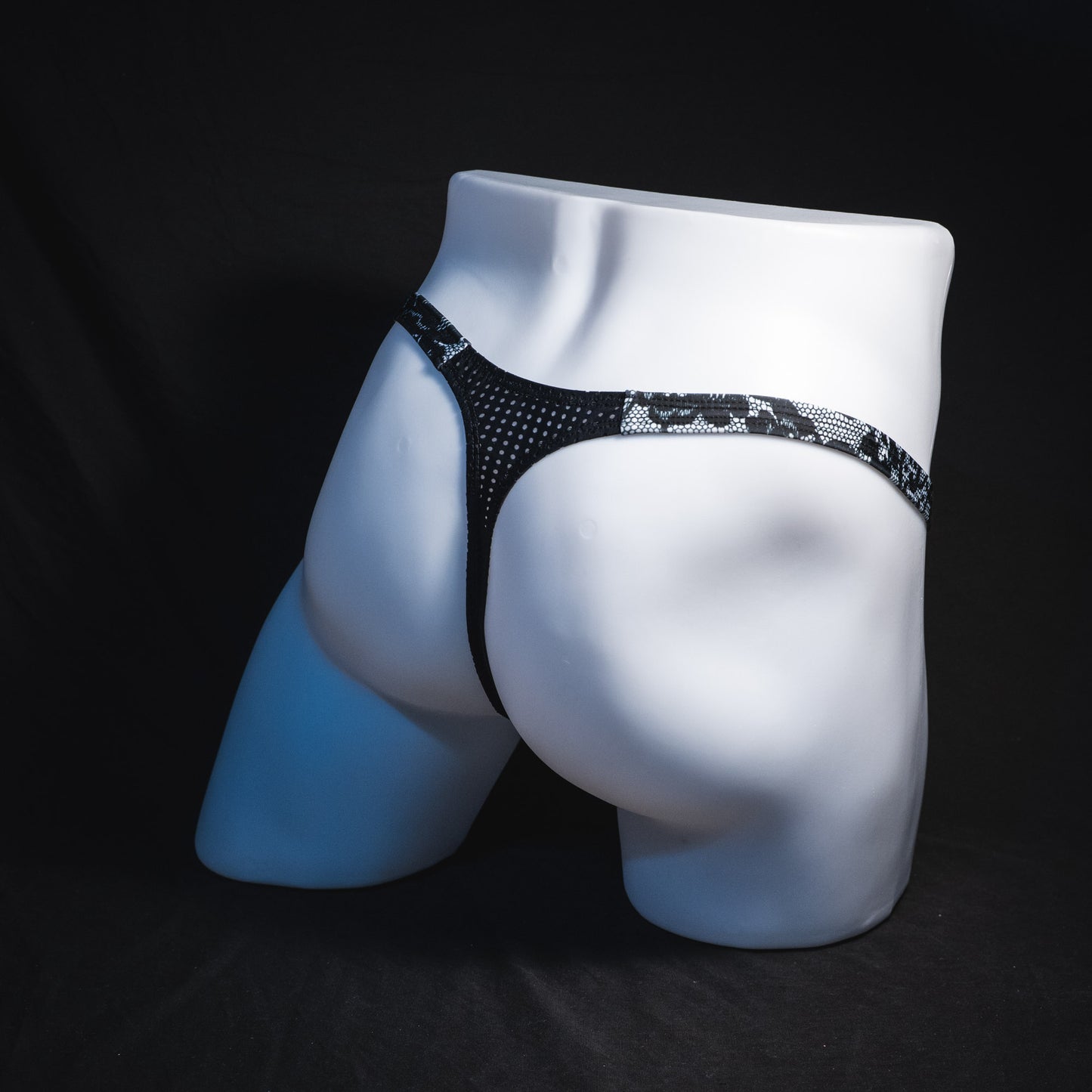 Men's lace and mesh thong underwear, classic cut, Rear angled view