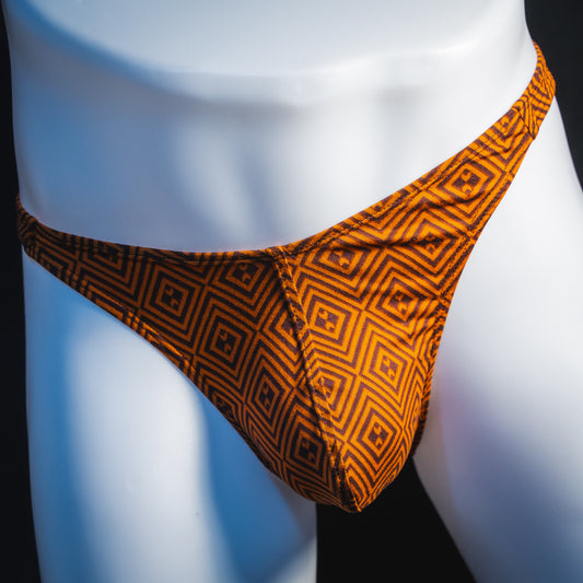 Men's geometric rust thong underwear, classic cut, front view.