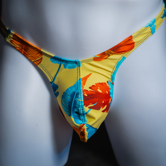 Men's yellow floral thong, slim cut, front view.