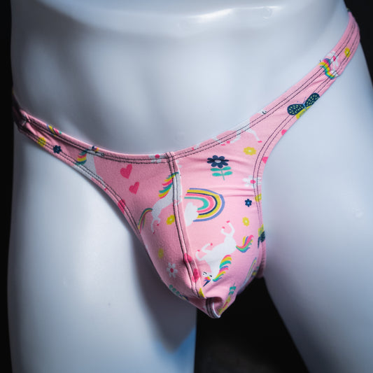 Men's pink unicorn thong, slim cut, front view.