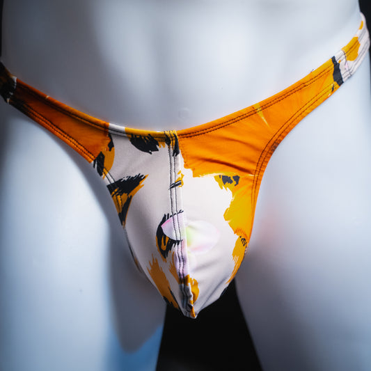Men's orange floral thong, slim cut, front view.