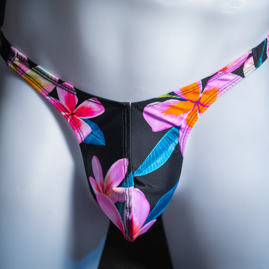 Men's pink floral thong, slim cut, front view.