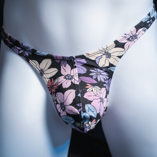 Men's purple floral thong, slim cut, front view.