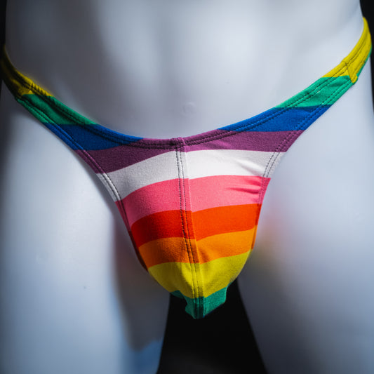 Men's rainbow striped thong underwear, slim cut, front view.