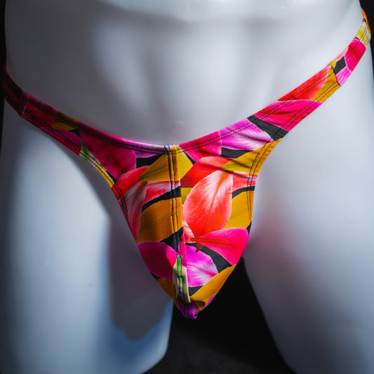 Men's bright floral thong, slim cut, front view.