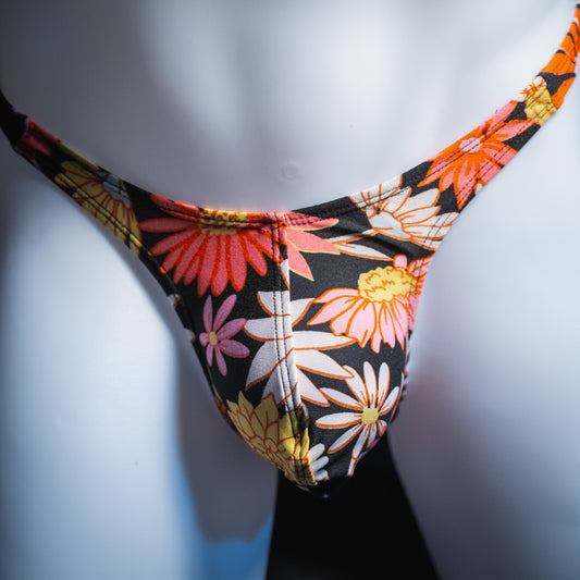 Men's floral thong, slim cut, front view.