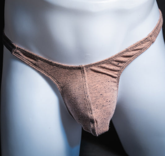 Men's soft pink thong, slim cut, front view.