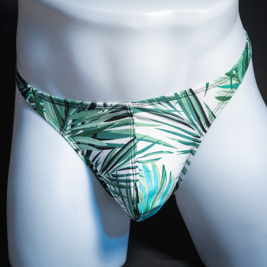 Men's tropical palm leaves thong, classic cut, front view.