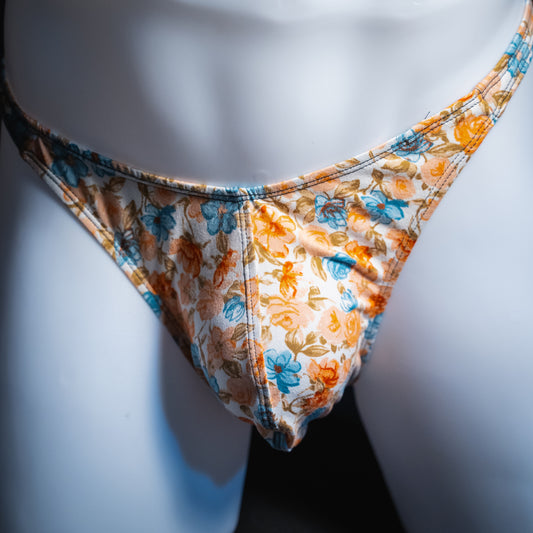 men's floral thong shown in classic cut from a front view