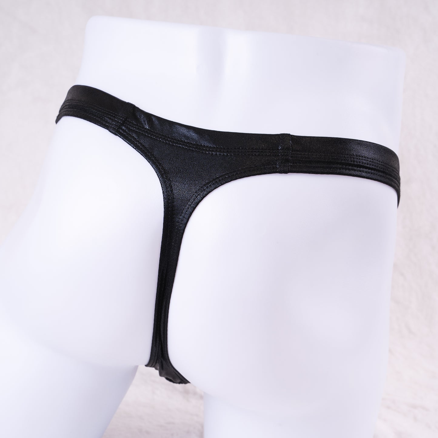 Men's pouch-less thong underwear, rear view.