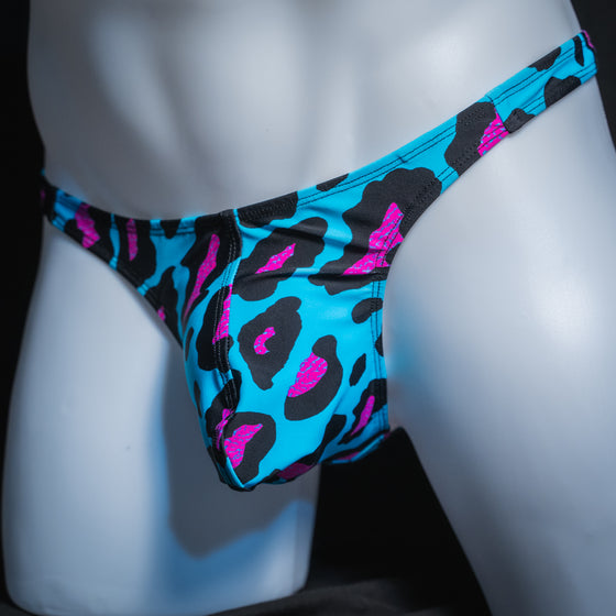 Men's blue and pink cheetah thong, classic cut, angled front view.