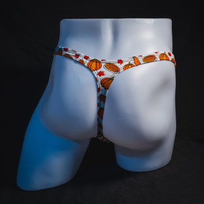 Men's pumpkin pie Thanksgiving thong underwear, classic cut, full rear view.