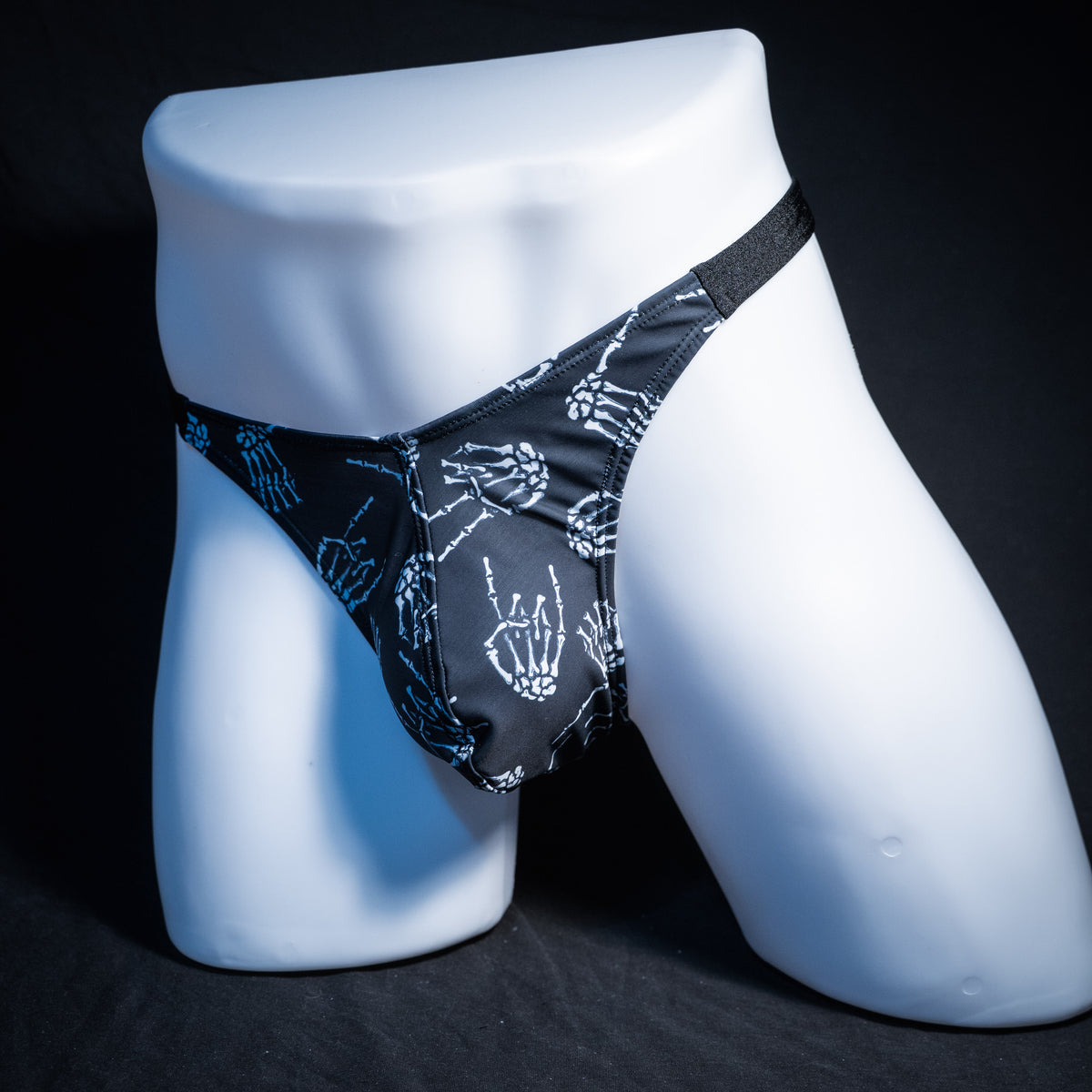 Men's skeleton hands thong underwear, classic cut, front view.