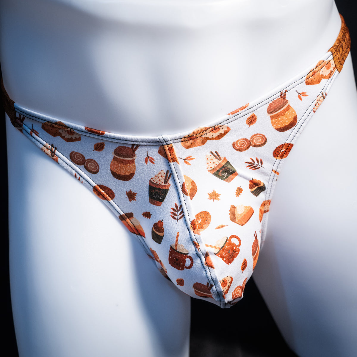 Men's autumn themed thong underwear, classic cut, front view.