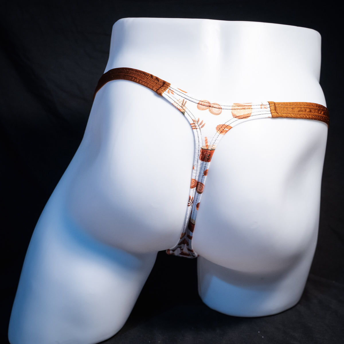 Men's autumn themed thong underwear, classic cut, rear view.