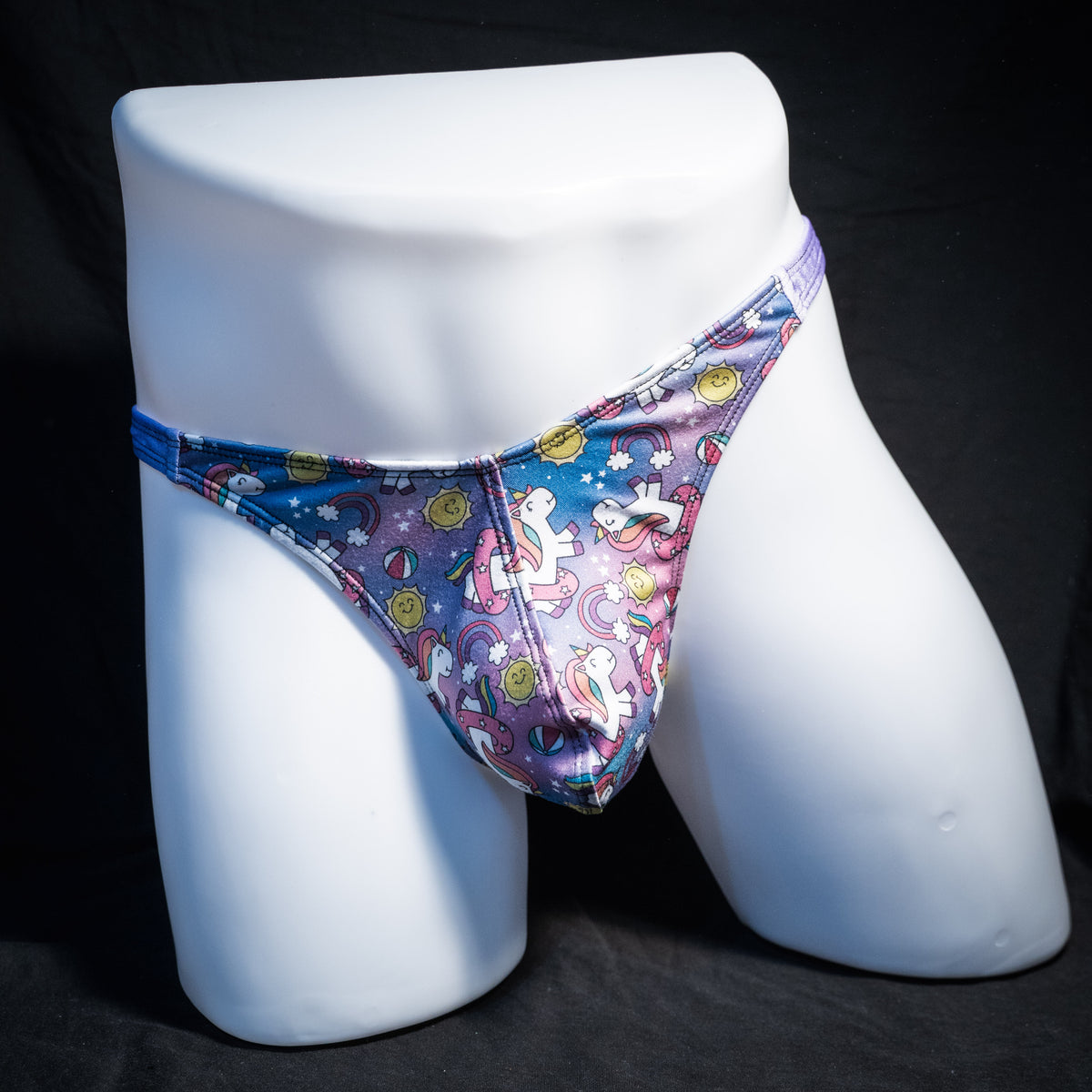 Men's unicorn print thong underwear, classic cut, front view.