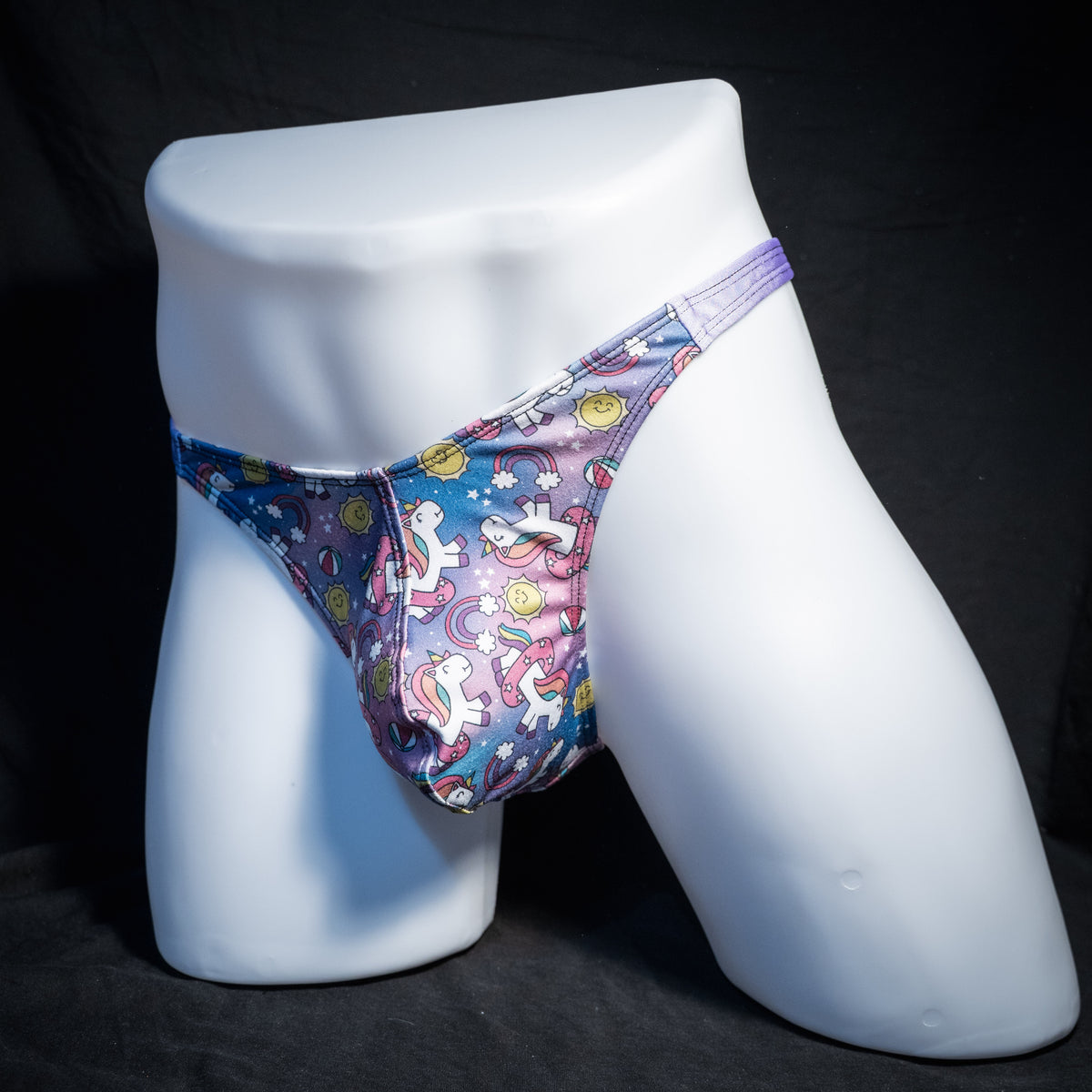 Men's unicorn print thong underwear, classic cut, front view.
