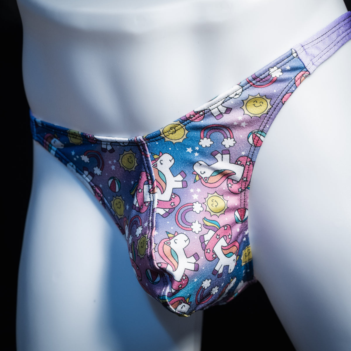 Men's unicorn print thong underwear, classic cut, front view.