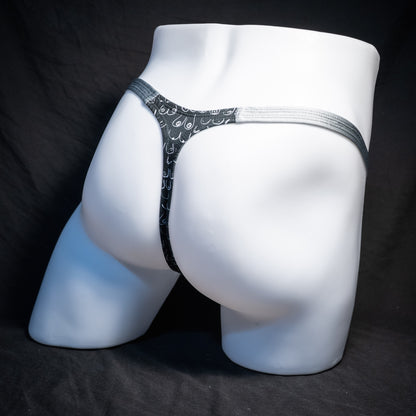 Men's boob patterned thong underwear, classic cut, rear view.