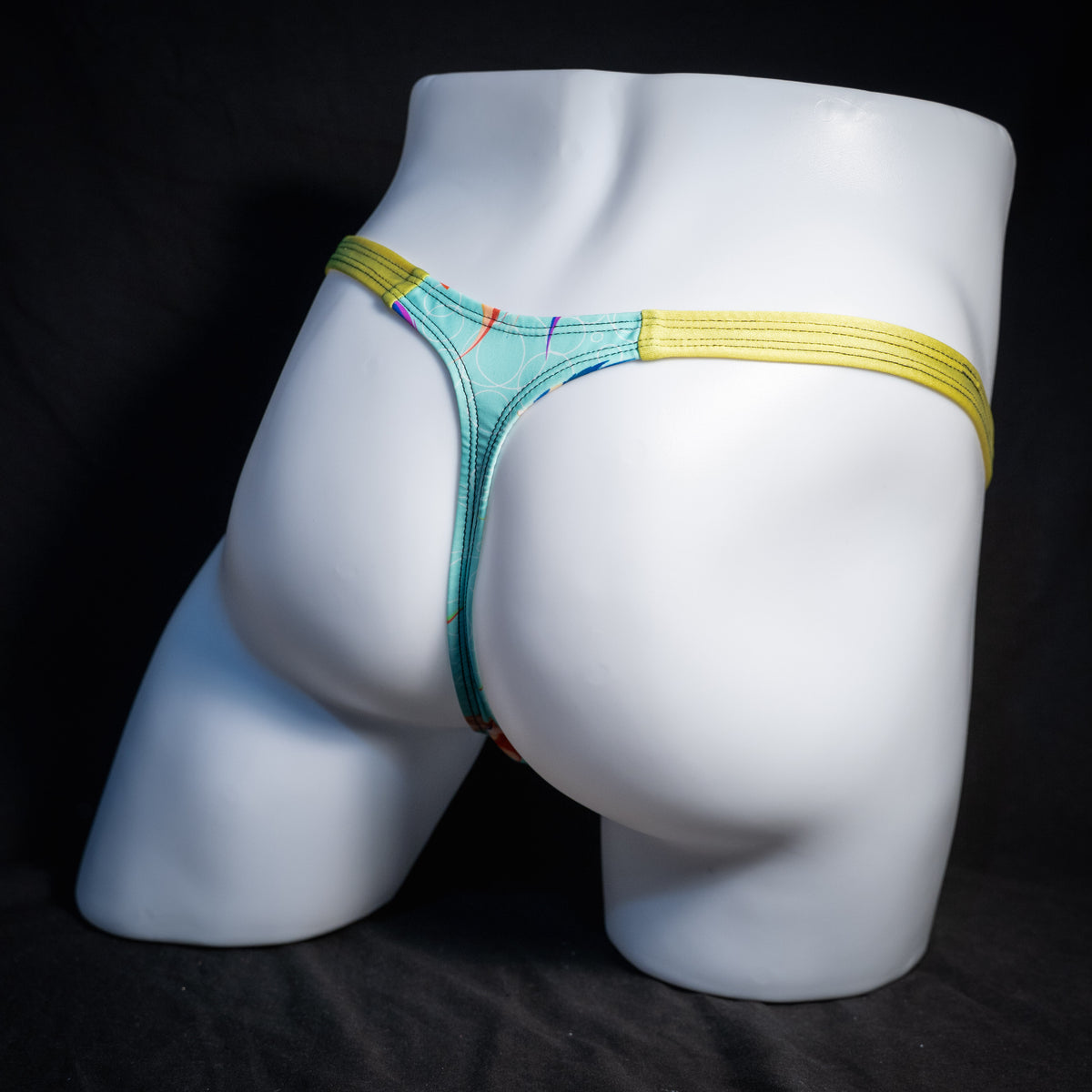 Men's fish themed thong underwear, classic cut, rear view.