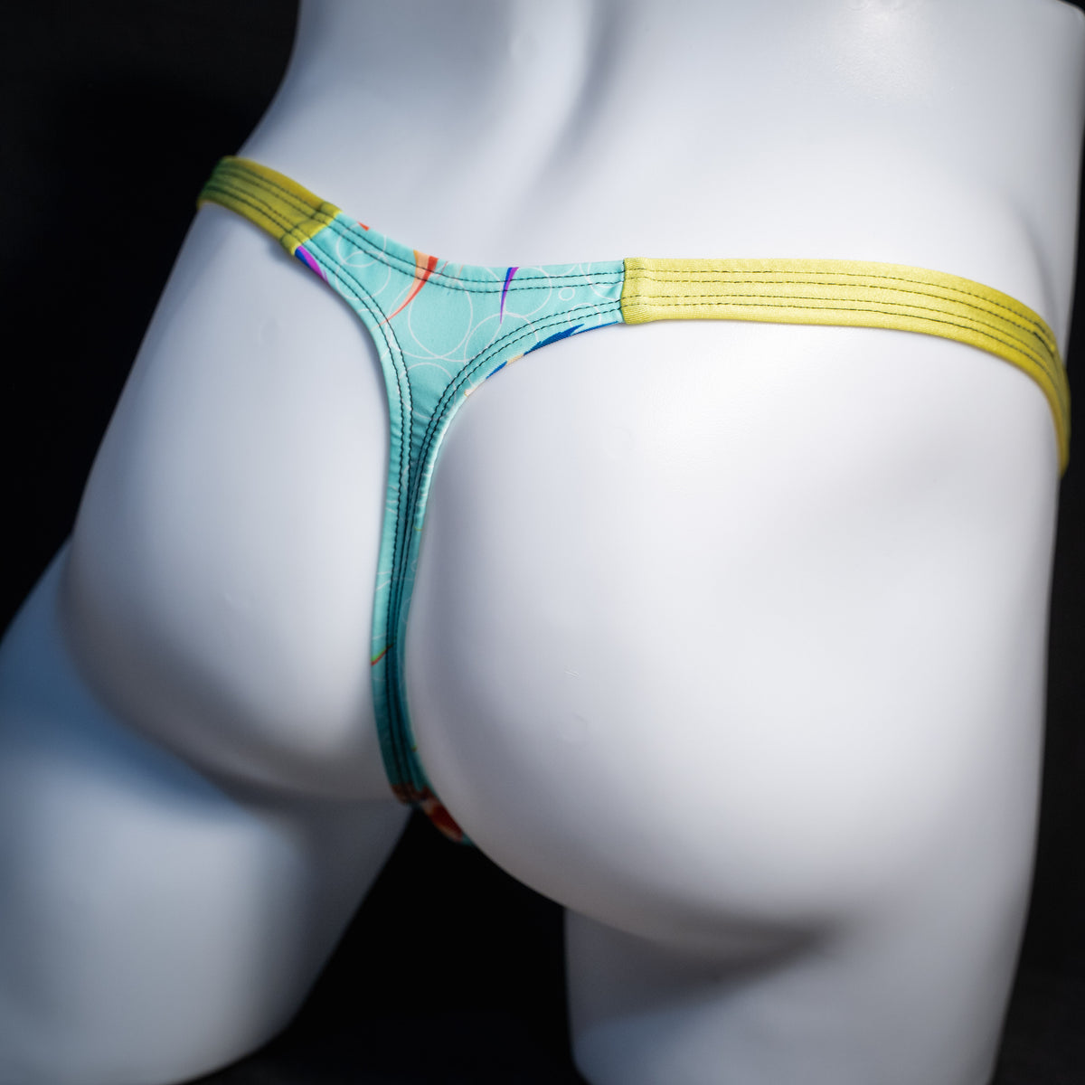 Men's fish themed thong underwear, classic cut, rear view.