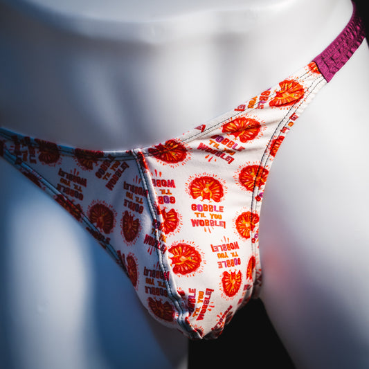 Men's Thanksgiving thong underwear, classic cut, angled front view.