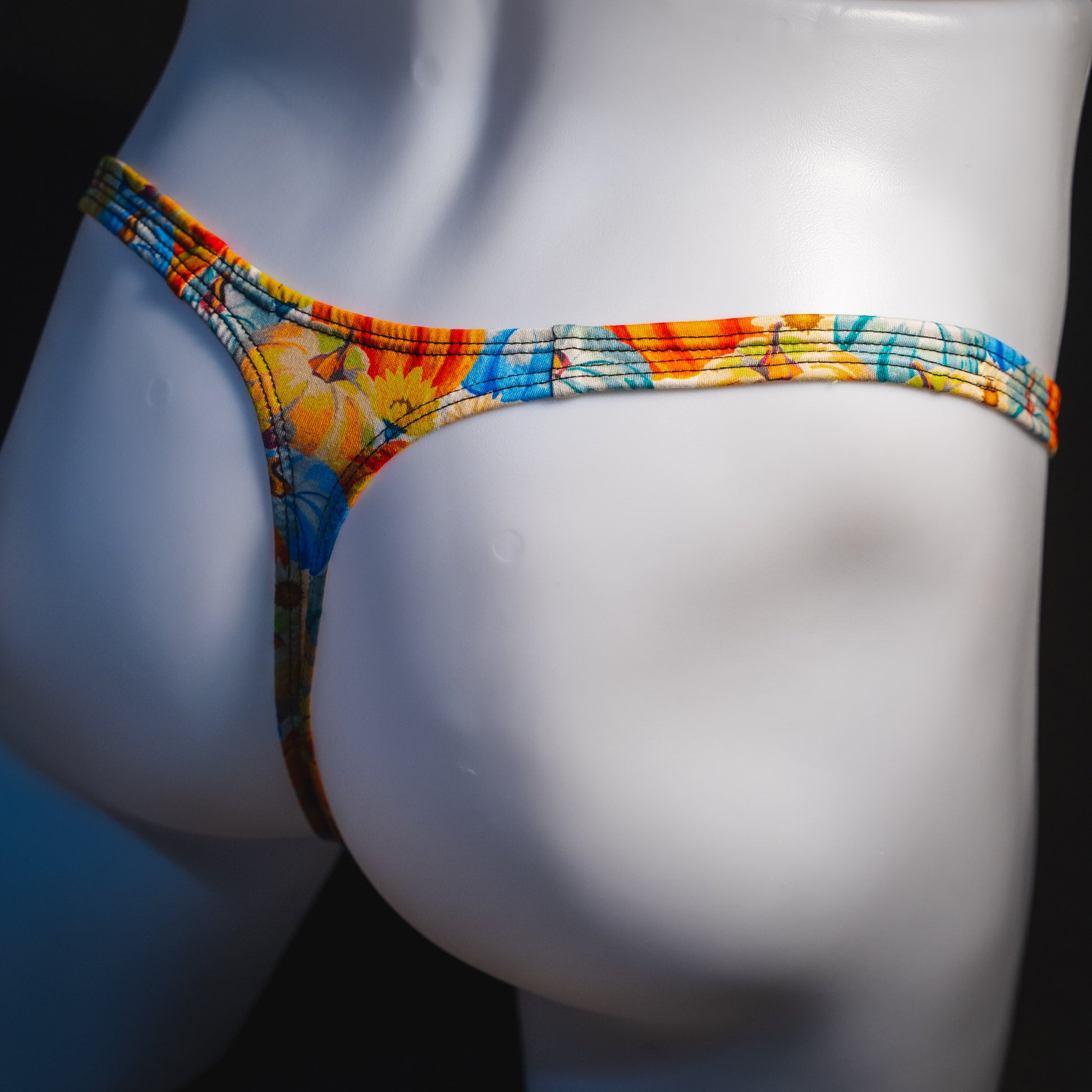 Men's autumn harvest thong underwear, classic cut, angled rear view.