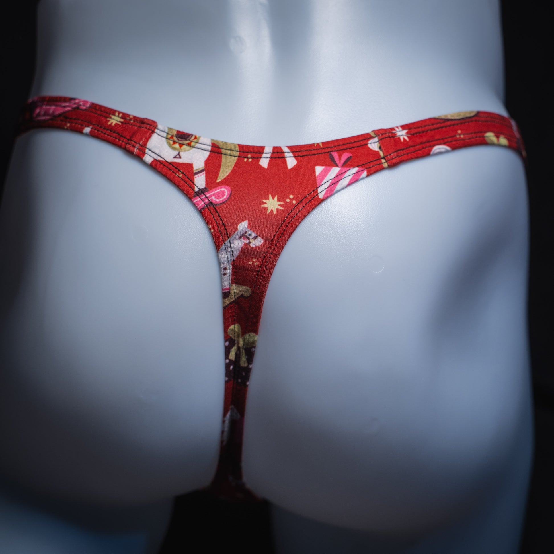 Men's Christmas gifts thong underwear, slim cut, rear view.