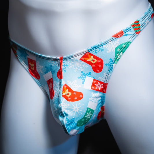 Men's Christmas stocking thong underwear, Classic cut, angled front view.