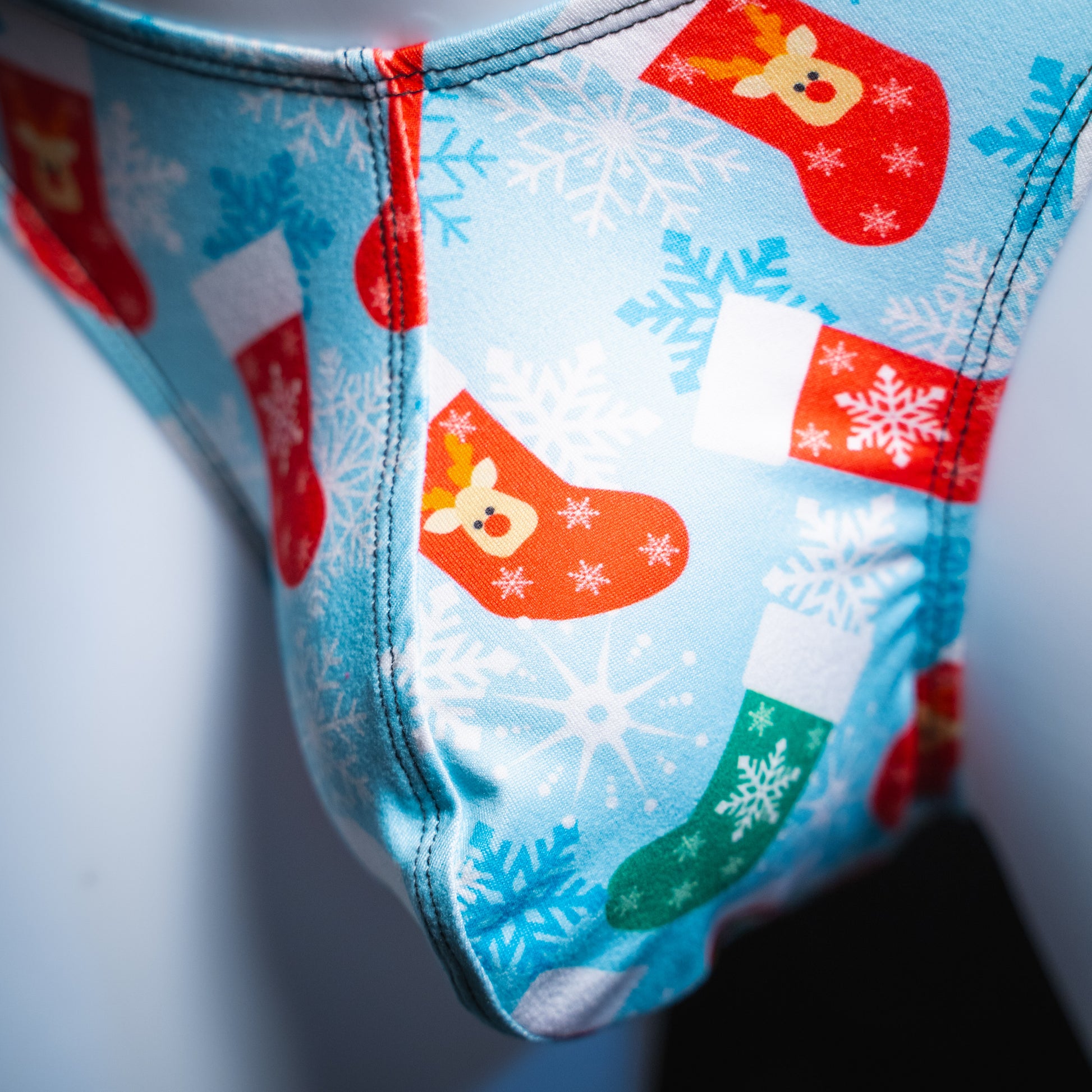 Men's Christmas stocking thong underwear, Classic cut, detailed front view.