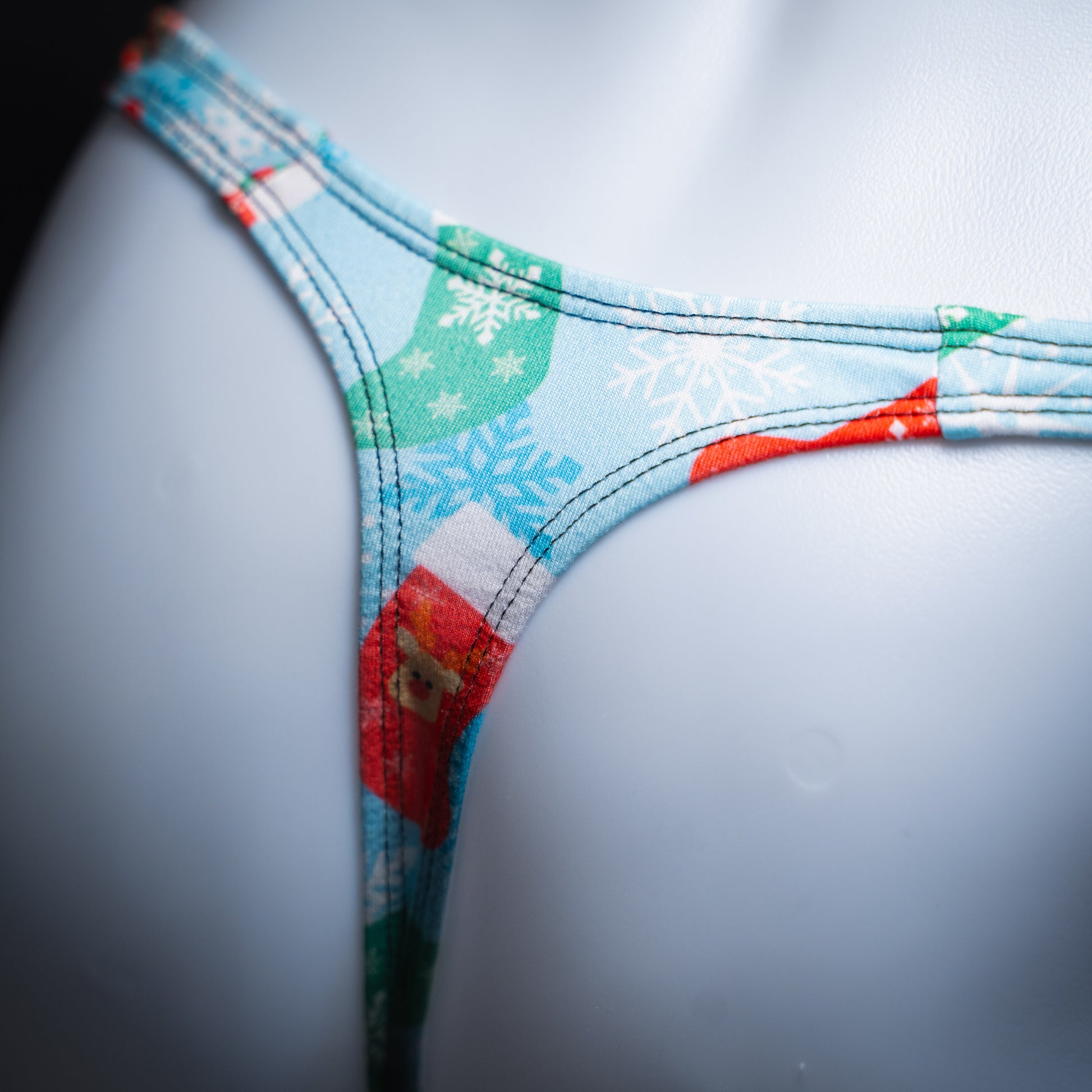 Men's Christmas stocking thong underwear, Classic cut, detailed rear view.