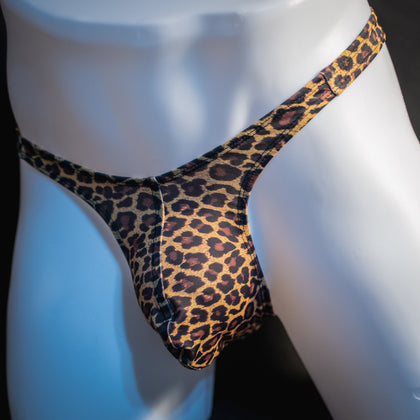 Men's brown leopard thong underwear, slim cut, angled front view.