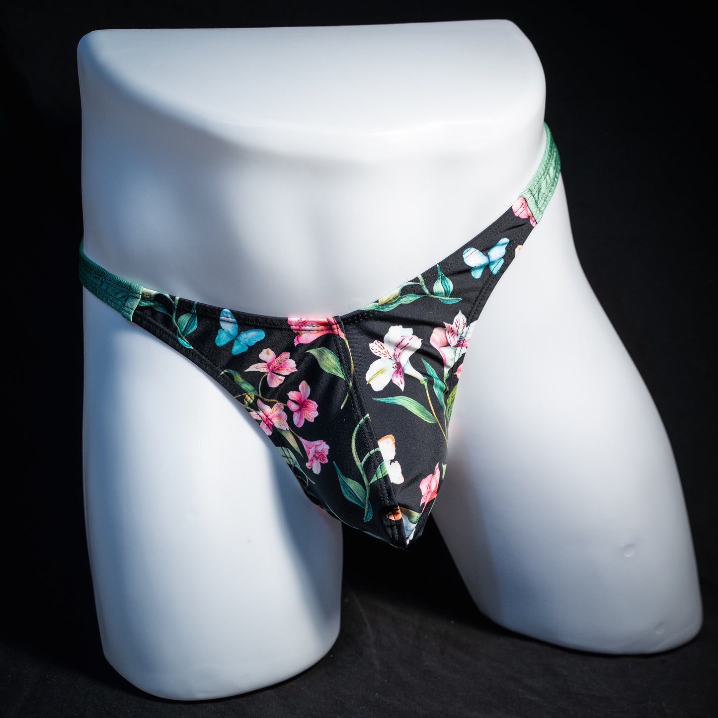 Men's floral thong underwear. classic cut, front view.