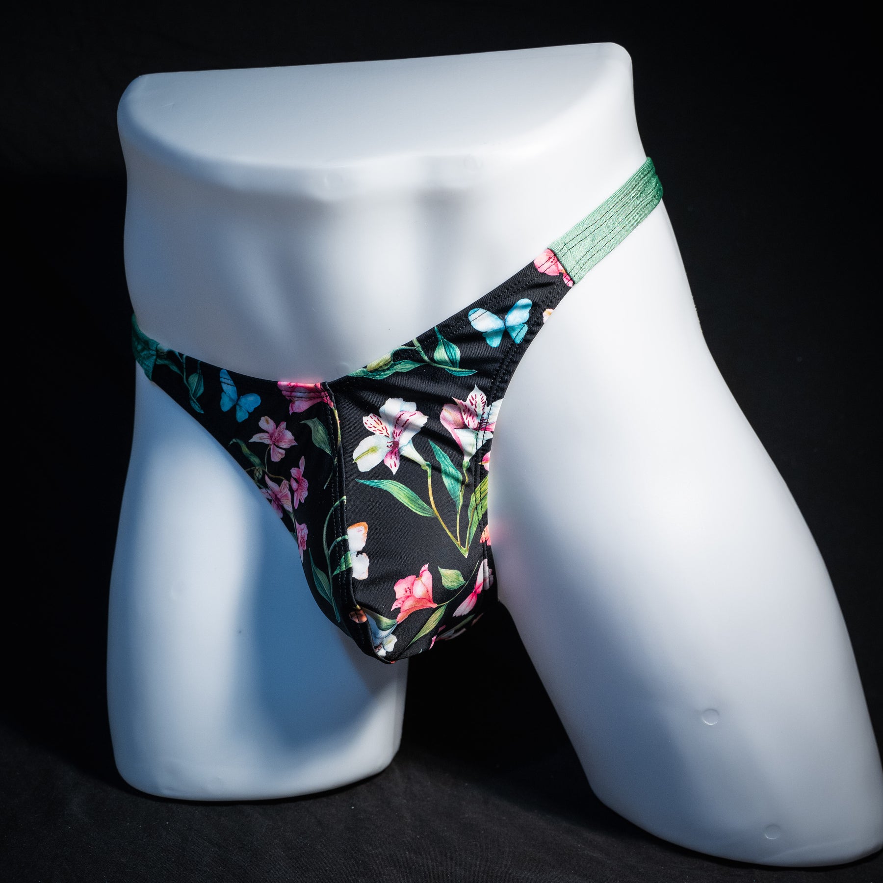 Men's floral thong underwear. classic cut, front view.