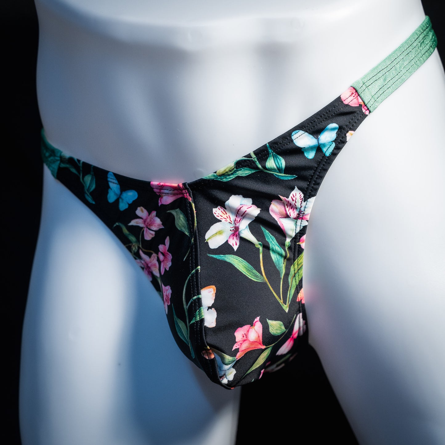 Men's floral thong underwear. classic cut, front view.