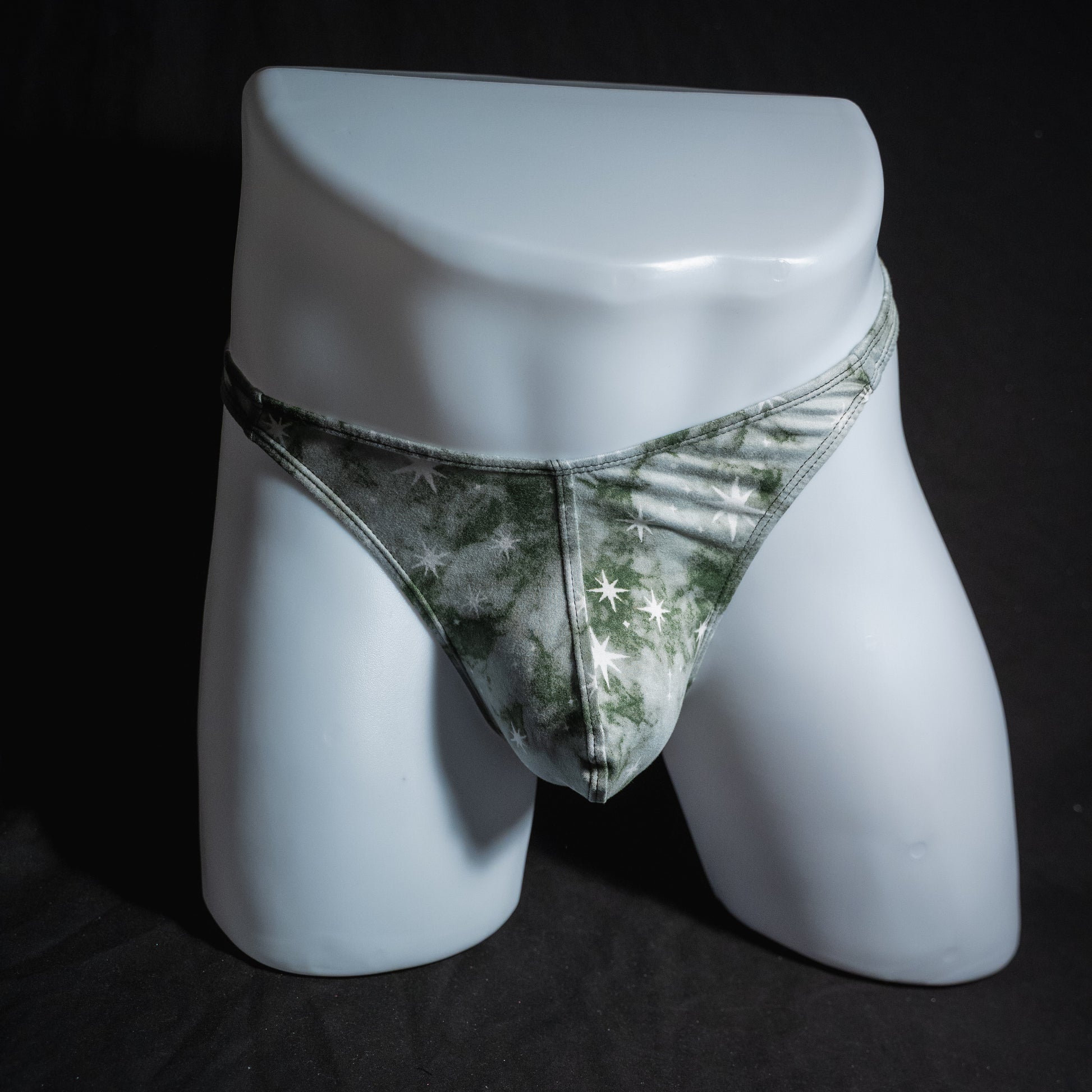Men's gray sky with stars thong underwear, classic cut, full front view.