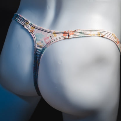 Men's nutcracker thong underwear, classic cut, angled rear view.