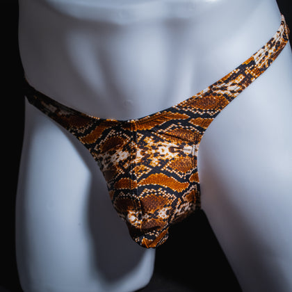 Men's rattlesnake thong underwear, slim cut, angled front view.