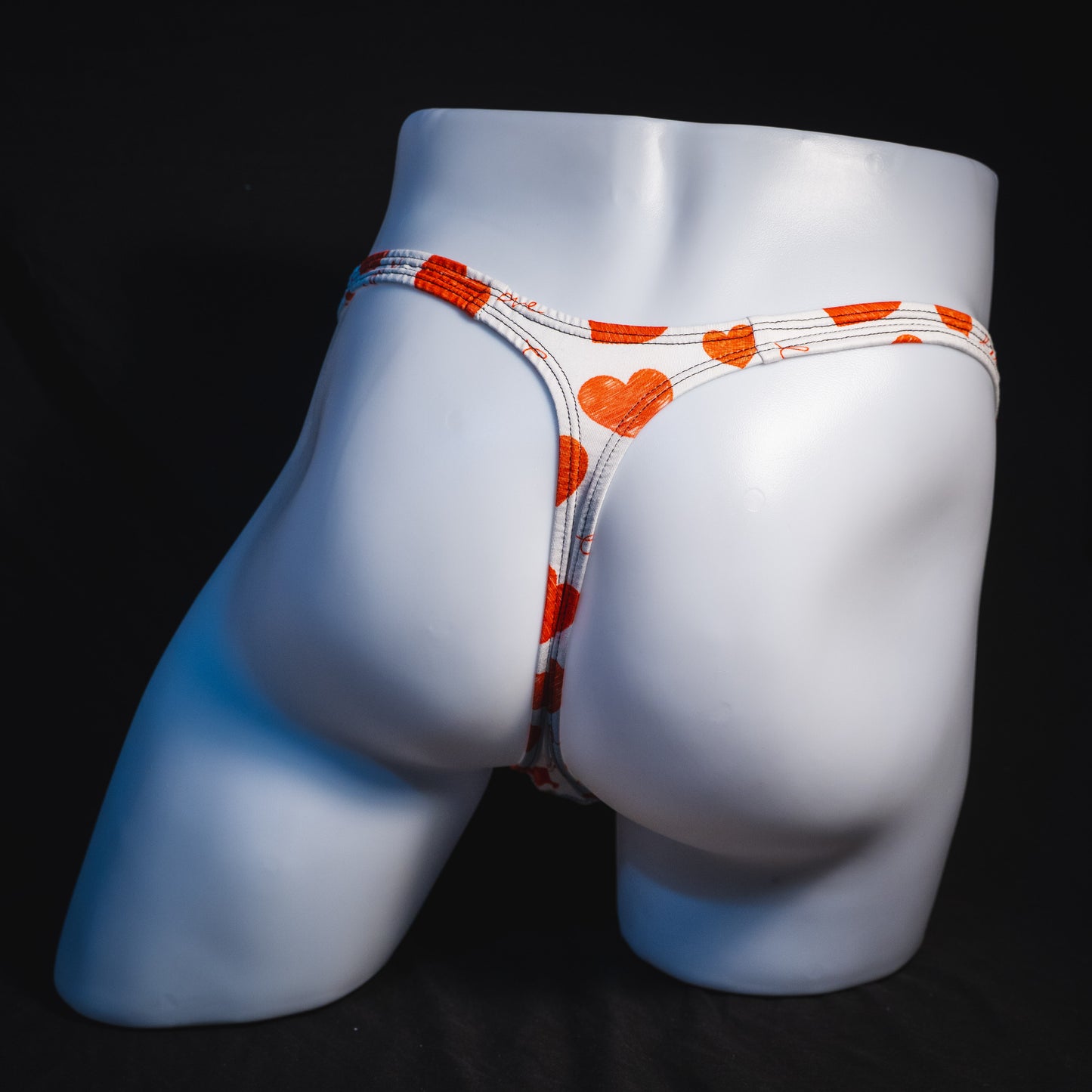 Men's red hearts Valentine's Day thong underwear, Classic cut, full rear view.