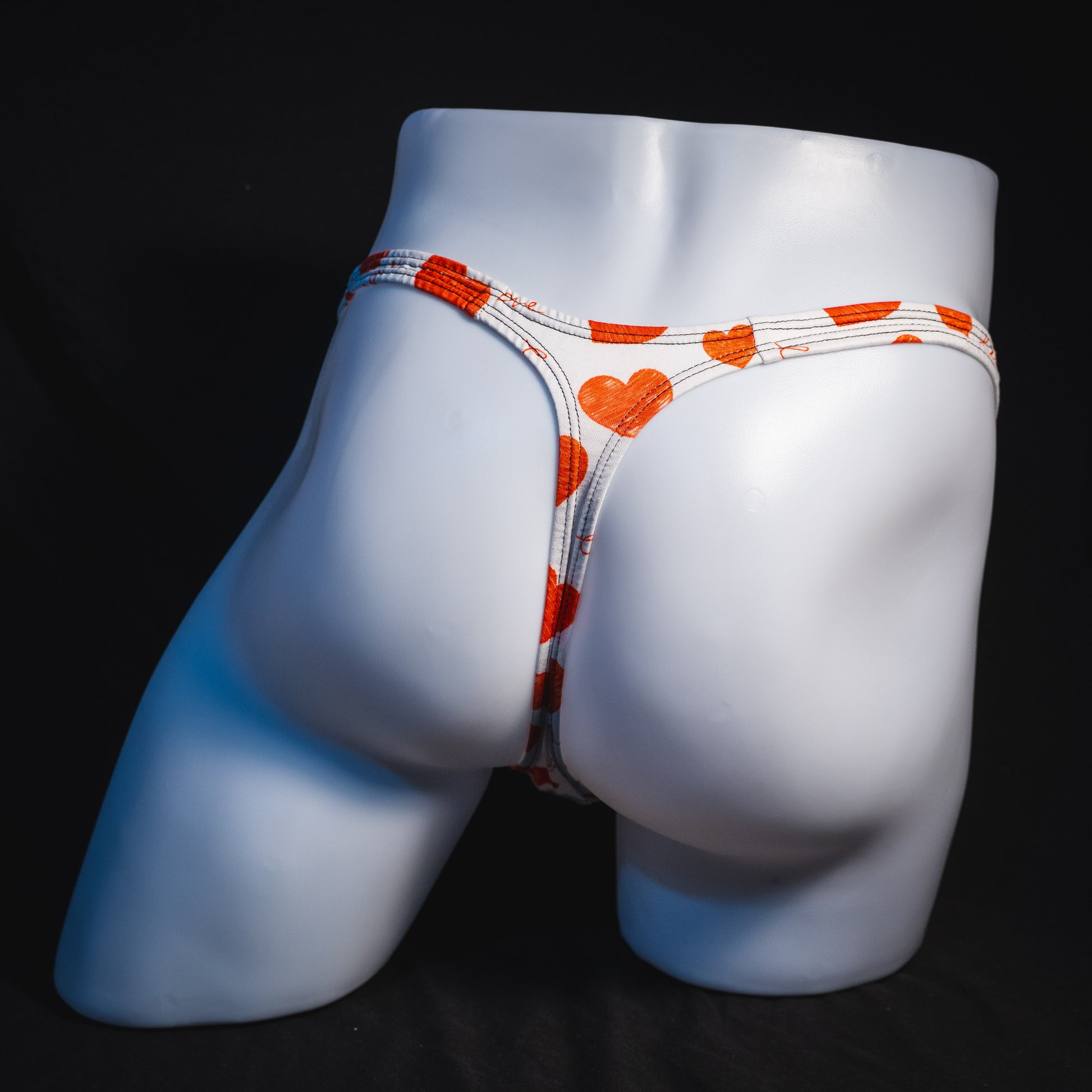 Men's red hearts Valentine's Day thong underwear, Classic cut, full rear view.