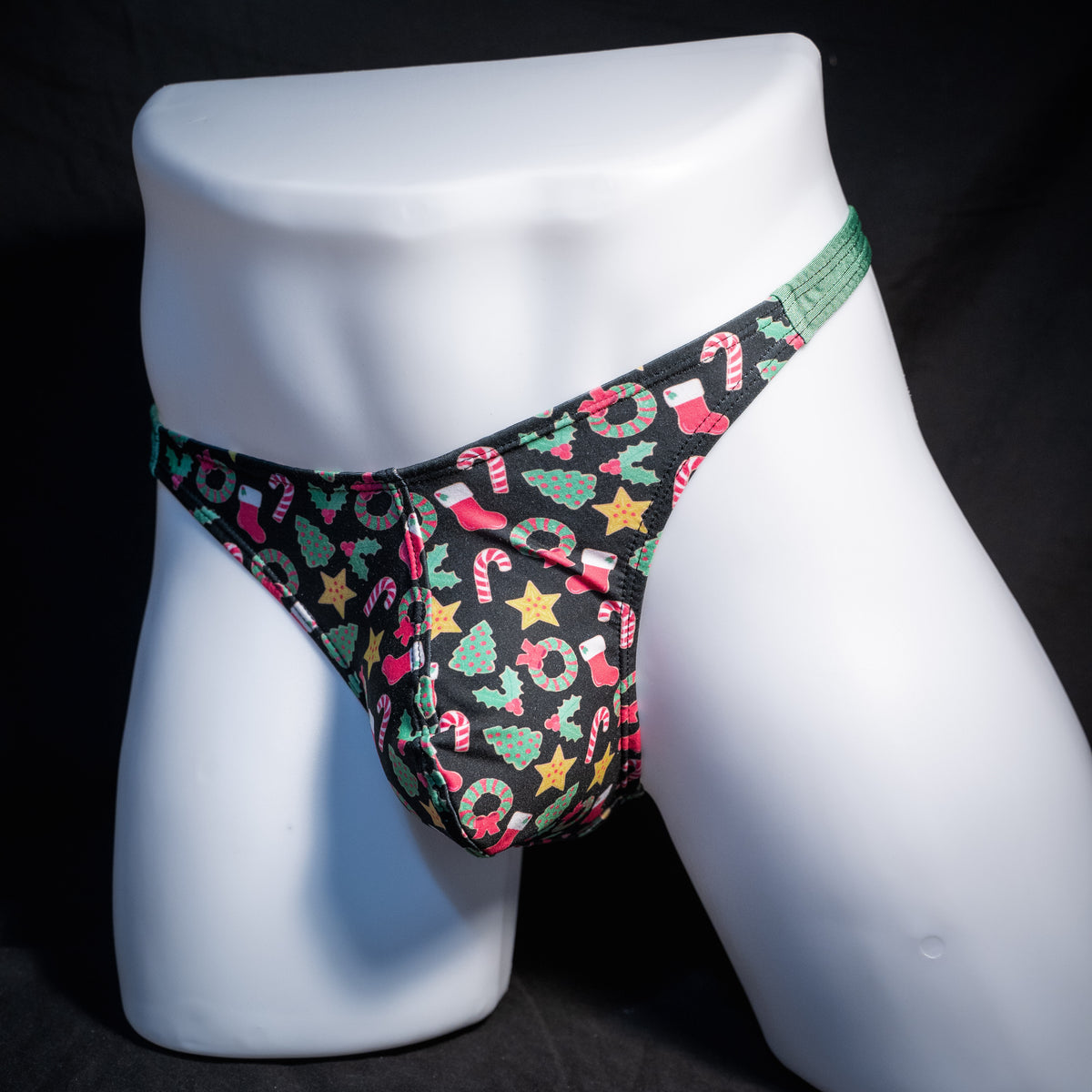 Men's Christmas themed thong underwear, classic cut, front view.