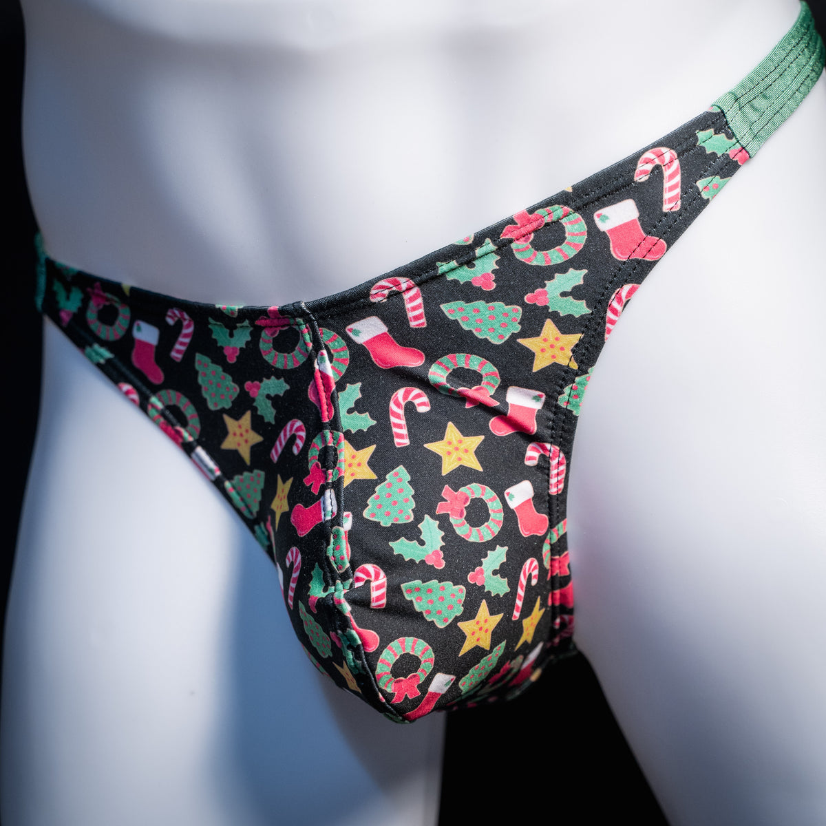 Men's Christmas themed thong underwear, classic cut, front view.
