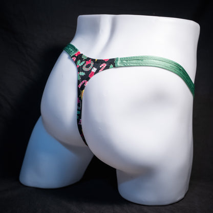 Men's Christmas themed thong underwear, classic cut, rear view.