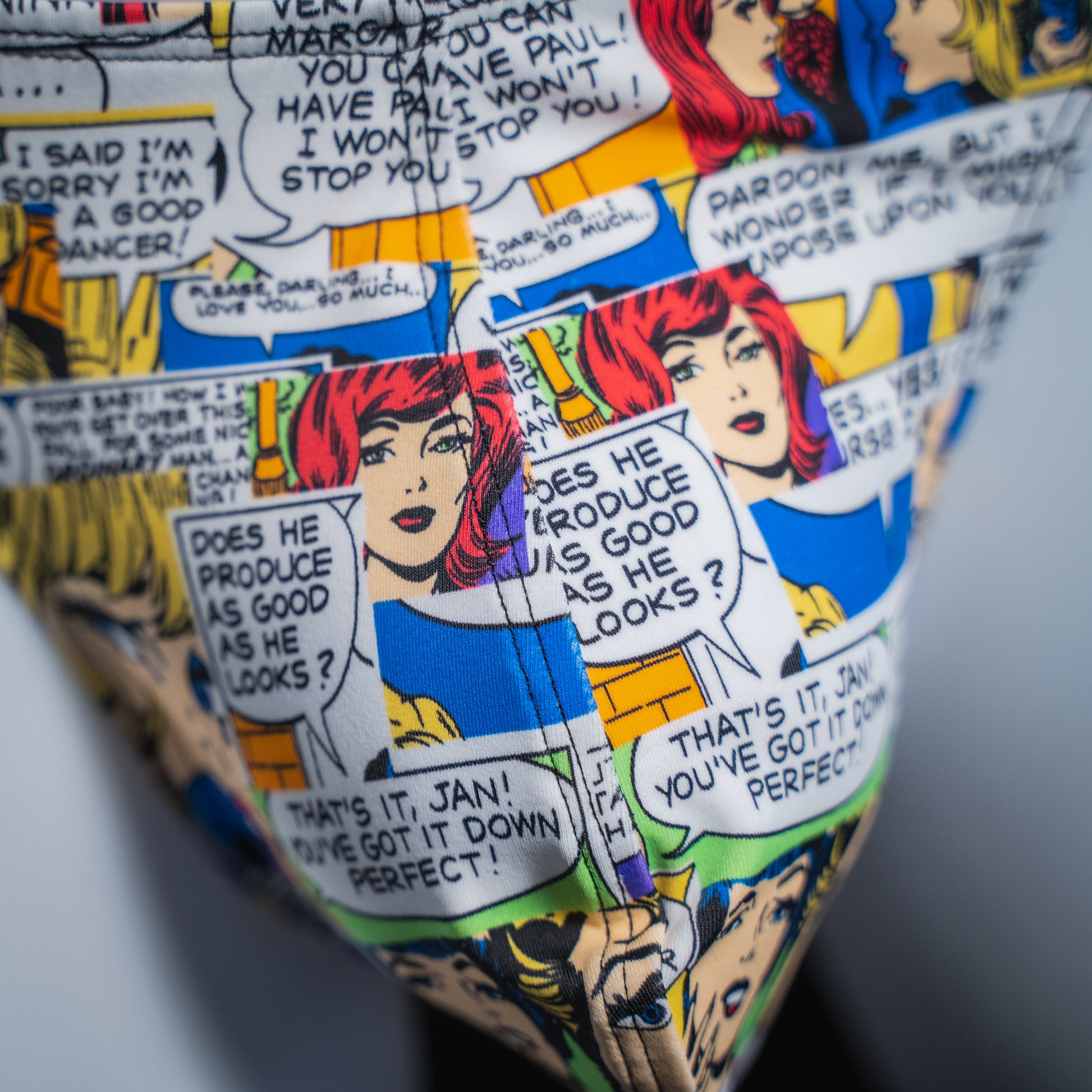 Men's comic book strip thong, classic cut, closeup front view.